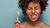 Is my toothpaste causing canker sore or mouth ulcer? - St Andrew's Trust woman holding bamboo toothbrush and squirming